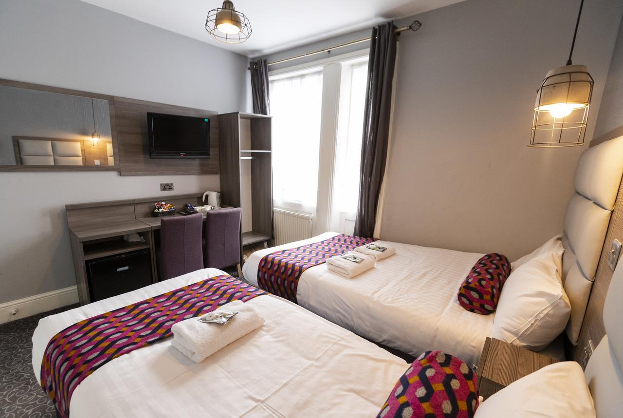 Comfotel Prpl Londres Quarto foto